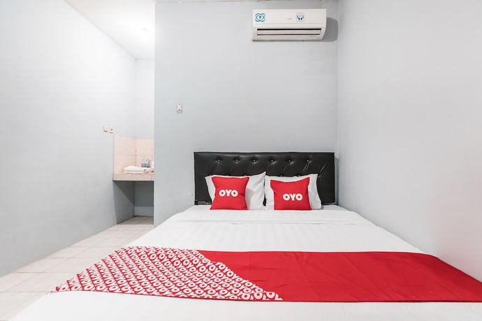 Imagen de la habitación del Hotel Oyo Living 1756 Amira Guest House. Foto 7