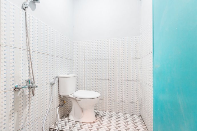 Imagen de la habitación del Hotel Oyo Living 1756 Amira Guest House. Foto 8