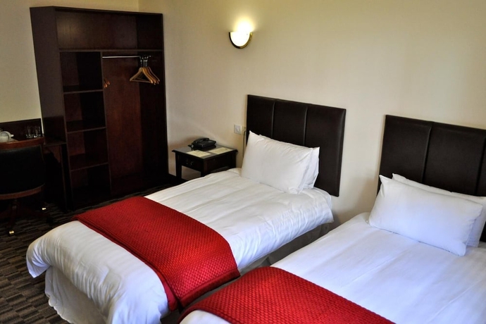 Imagen de la habitación del Hotel Oyo Lochway. Foto 14