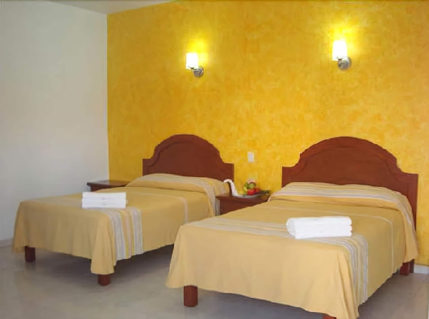 Imagen de la habitación del Hotel Oyo Mi Casa. Foto 10