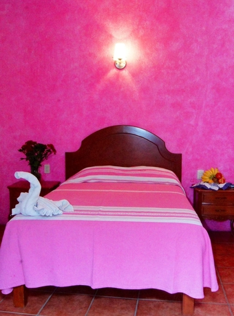 Imagen de la habitación del Hotel Oyo Mi Casa. Foto 11