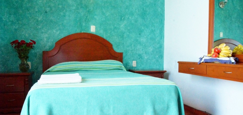 Imagen de la habitación del Hotel Oyo Mi Casa. Foto 12