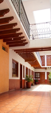 Imagen de la habitación del Hotel Oyo Mi Casa. Foto 13