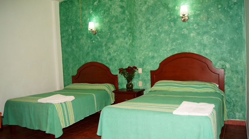 Imagen de la habitación del Hotel Oyo Mi Casa. Foto 14
