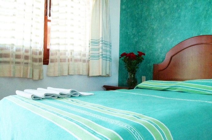 Imagen de la habitación del Hotel Oyo Mi Casa. Foto 15