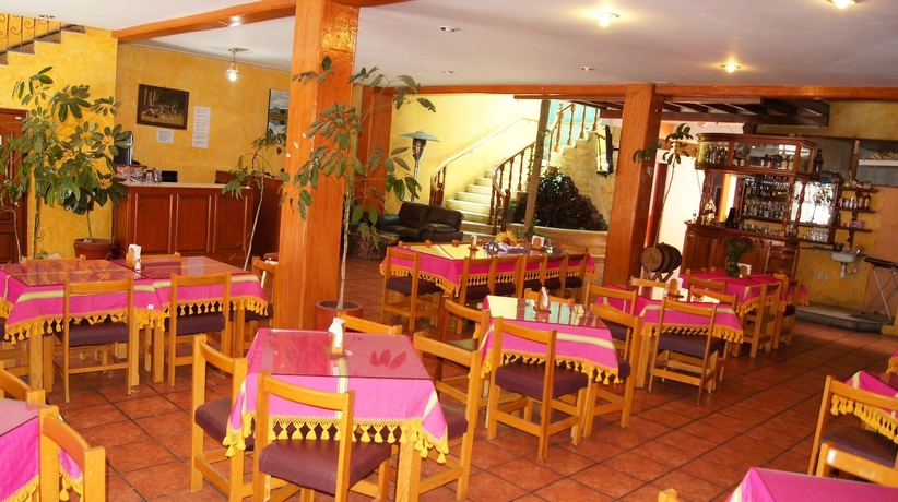 Imagen del bar/restaurante del Hotel Oyo Mi Casa. Foto 8