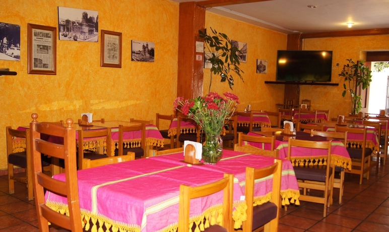 Imagen del bar/restaurante del Hotel Oyo Mi Casa. Foto 9