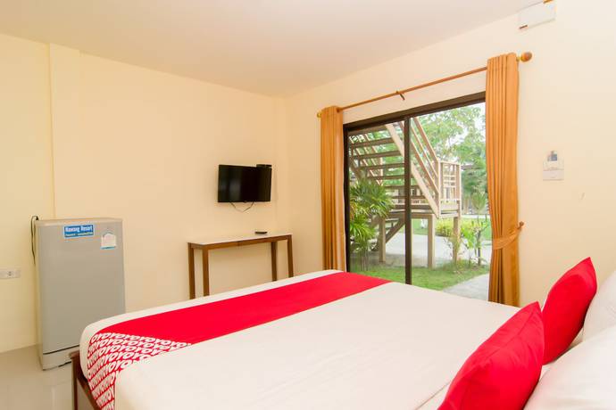 Imagen de la habitación del Hotel Oyo Nawang Resort. Foto 6