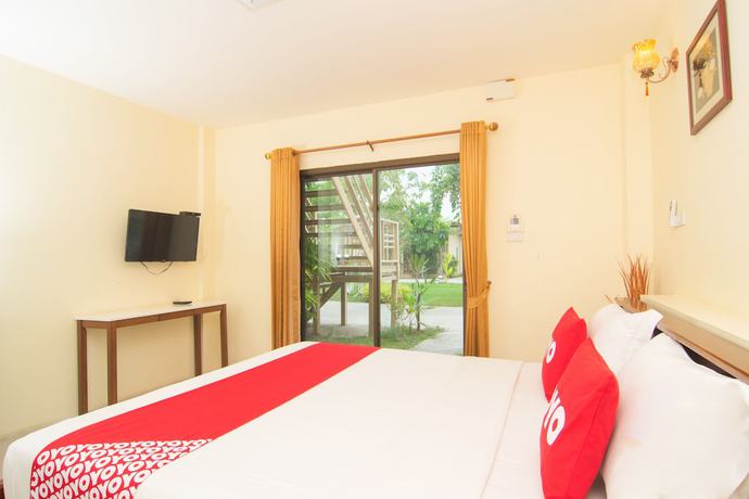 Imagen de la habitación del Hotel Oyo Nawang Resort. Foto 7