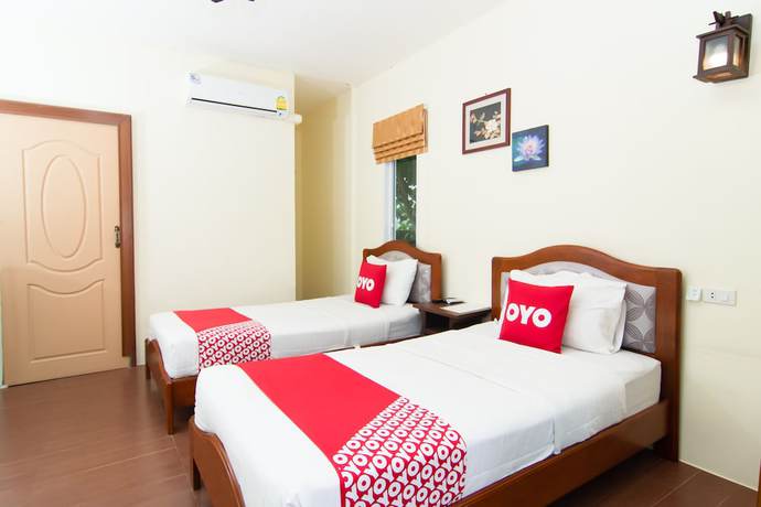 Imagen de la habitación del Hotel Oyo Nawang Resort. Foto 9
