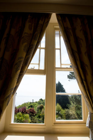 Imagen de la habitación del Hotel Oyo Orestone Manor. Foto 4