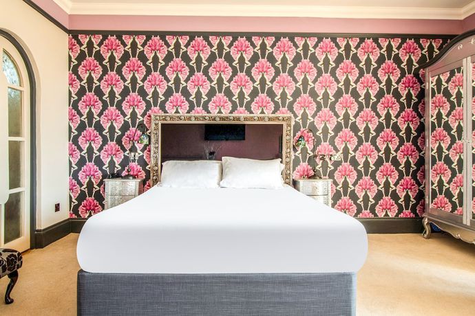Imagen de la habitación del Hotel Oyo Orestone Manor. Foto 6