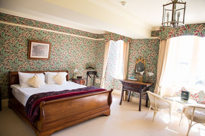 Imagen de la habitación del Hotel Oyo Orestone Manor. Foto 7