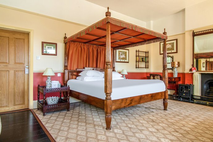 Imagen de la habitación del Hotel Oyo Orestone Manor. Foto 8