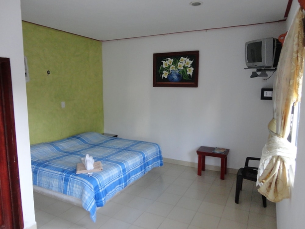 Imagen de la habitación del Hotel Oyo Palma Real. Foto 5