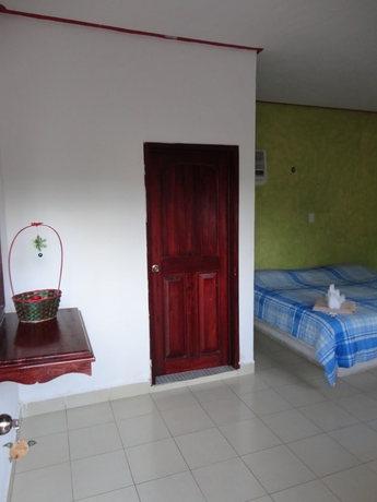 Imagen de la habitación del Hotel Oyo Palma Real. Foto 6