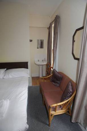 Imagen de la habitación del Hotel Oyo Queens Quarter. Foto 4