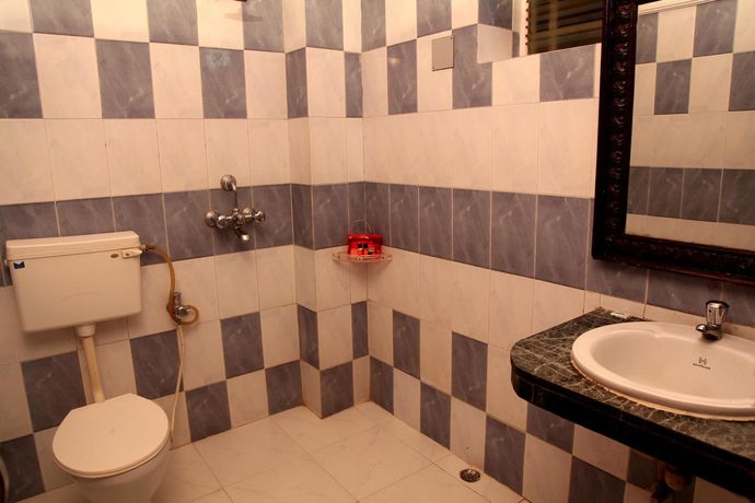 Imagen de la habitación del Hotel Oyo Rooms Mahmoorganj. Foto 4