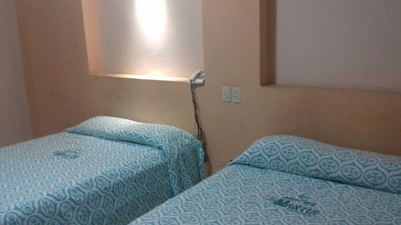 Imagen de la habitación del Hotel Oyo San Martin. Foto 6
