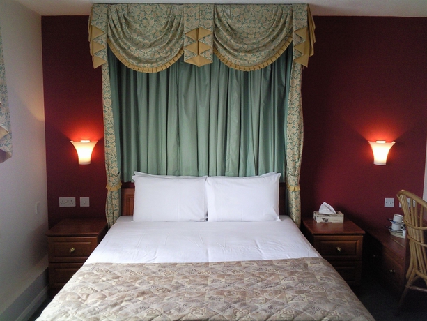 Imagen de la habitación del Hotel Oyo Shilton Inn. Foto 6