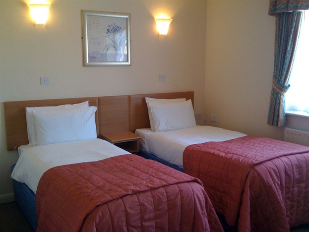 Imagen de la habitación del Hotel Oyo Shilton Inn. Foto 7