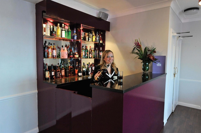 Imagen del bar/restaurante del Hotel Oyo Stade Court. Foto 10