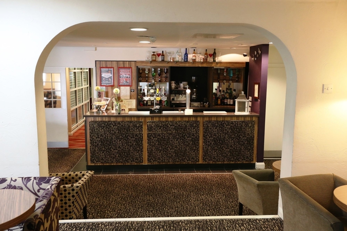 Imagen del bar/restaurante del Hotel Oyo The Bridge House. Foto 6