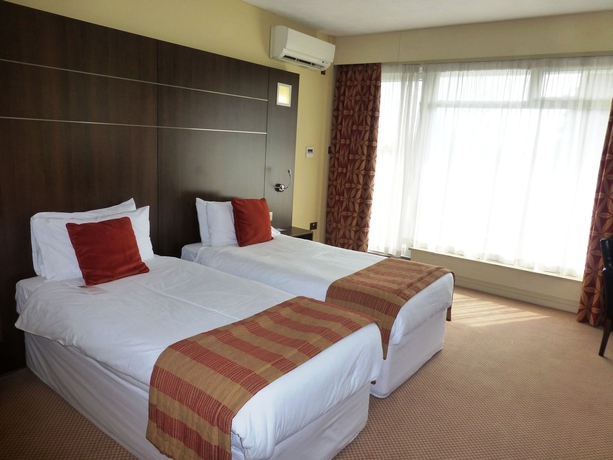 Imagen de la habitación del Hotel Oyo The Bridge House. Foto 7