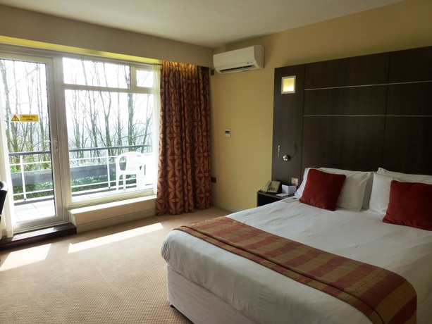 Imagen de la habitación del Hotel Oyo The Bridge House. Foto 11