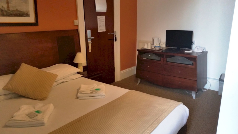 Imagen de la habitación del Hotel Oyo The Strand. Foto 4