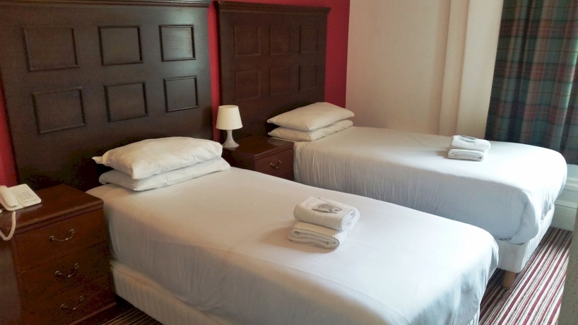 Imagen de la habitación del Hotel Oyo The Strand. Foto 11