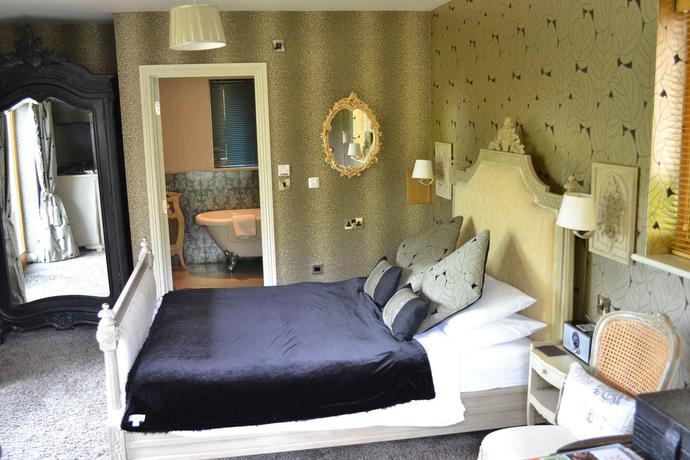 Imagen de la habitación del Hotel Oyo The Townhouse. Foto 6