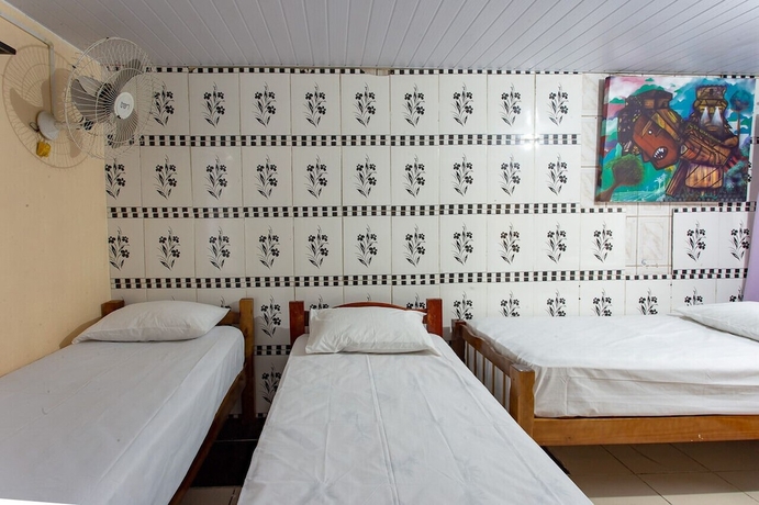 Imagen de la habitación del Hotel Oyo Toka Do Skillo. Foto 3