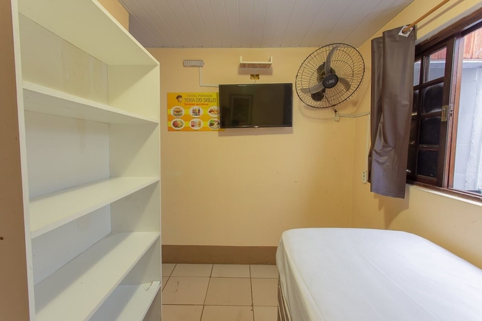 Imagen de la habitación del Hotel Oyo Toka Do Skillo. Foto 9