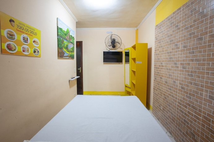 Imagen de la habitación del Hotel Oyo Toka Do Skillo. Foto 12
