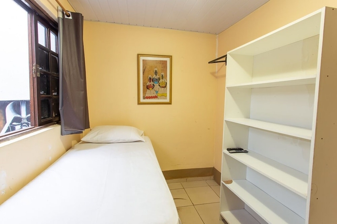 Imagen de la habitación del Hotel Oyo Toka Do Skillo. Foto 14