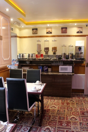 Imagen del bar/restaurante del Hotel Oyo Vegas. Foto 2