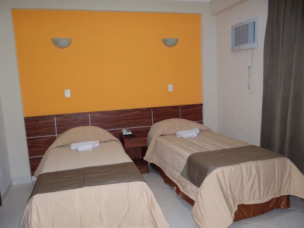 Imagen de la habitación del Hotel Oyo Villa Tijuca. Foto 10