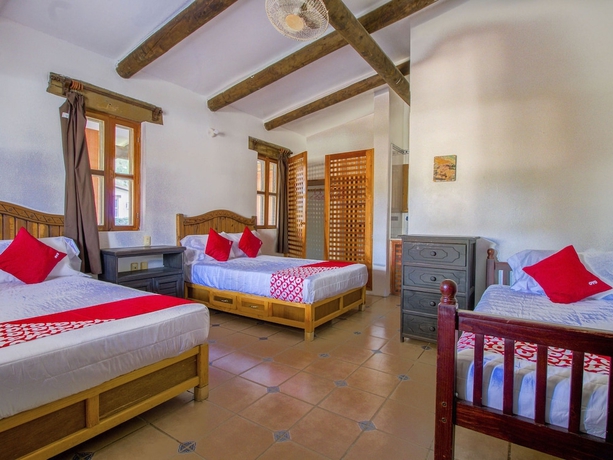 Imagen de la habitación del Hotel Oyo Villas Palmira. Foto 8