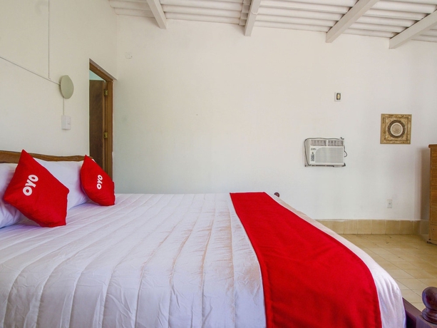 Imagen de la habitación del Hotel Oyo Villas Palmira. Foto 10