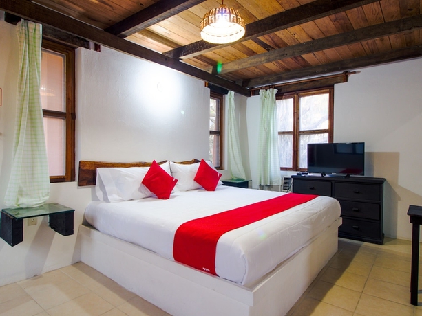 Imagen de la habitación del Hotel Oyo Villas Palmira. Foto 11