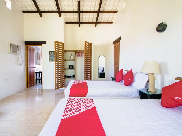 Imagen de la habitación del Hotel Oyo Villas Palmira. Foto 13