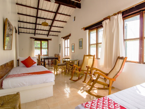 Imagen de la habitación del Hotel Oyo Villas Palmira. Foto 14