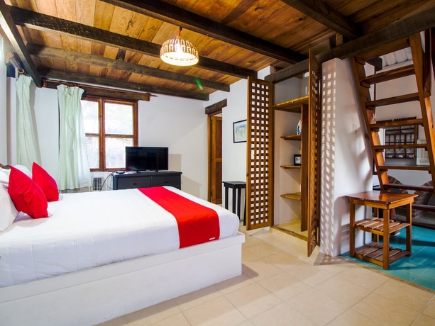 Imagen de la habitación del Hotel Oyo Villas Palmira. Foto 16