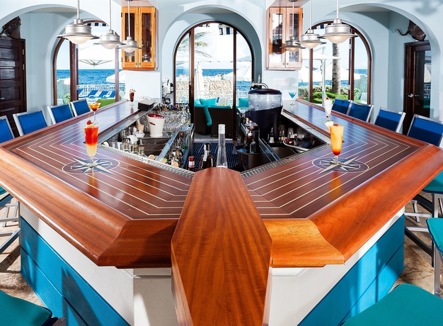 Imagen del bar/restaurante del Hotel Oyster Bay Beach Resort. Foto 2