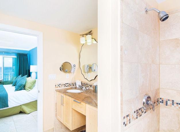 Imagen de la habitación del Hotel Oyster Bay Beach Resort. Foto 5