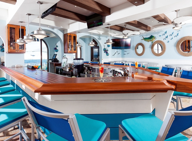 Imagen del bar/restaurante del Hotel Oyster Bay Beach Resort. Foto 3
