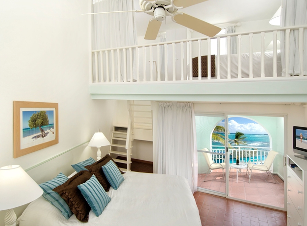 Imagen de la habitación del Hotel Oyster Bay Beach Resort. Foto 10