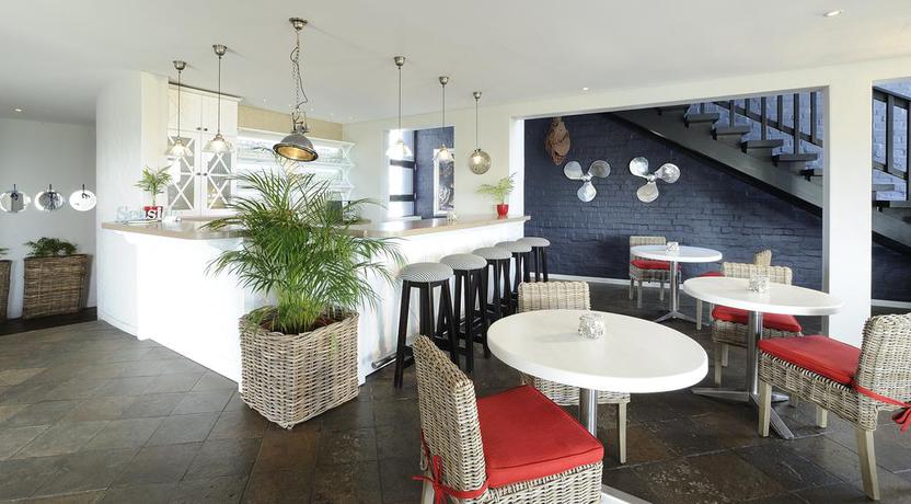 Imagen del bar/restaurante del Hotel Oyster Box Guesthouse. Foto 2