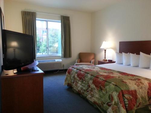 Imagen de la habitación del Hotel Oyster Point Inn & Suites. Foto 5